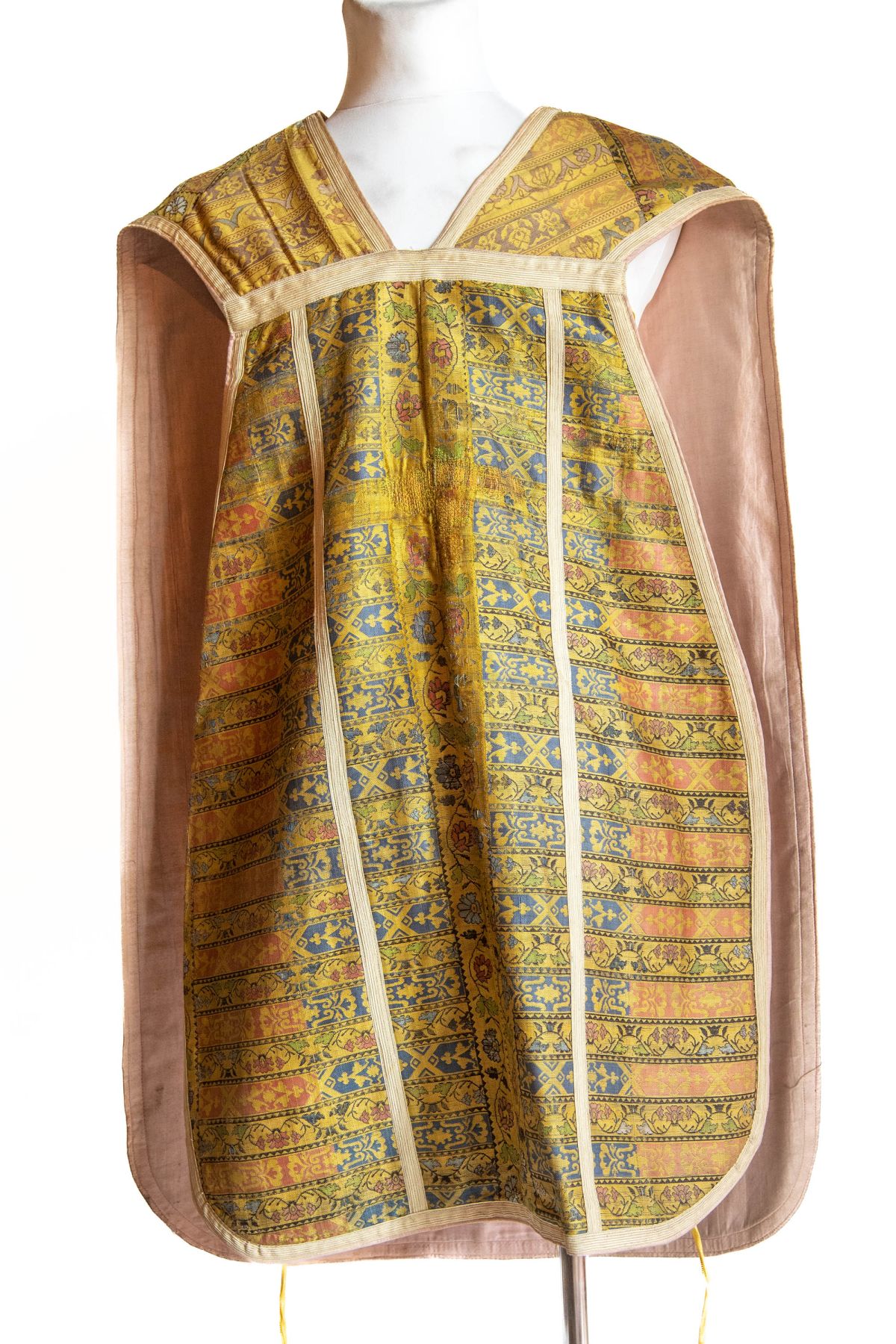 White chasuble with red/white/blue floral patterns