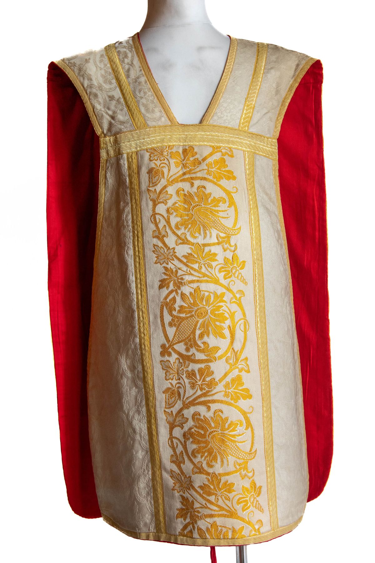White chasuble with gold embroidered belt and piping